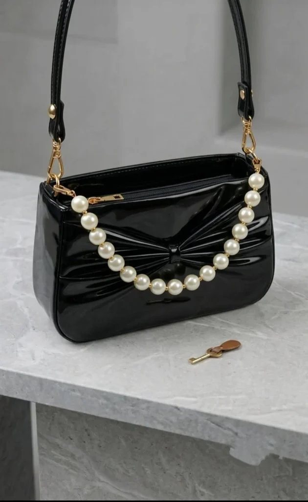 The Patent Bow Bag handbag by Zhenova