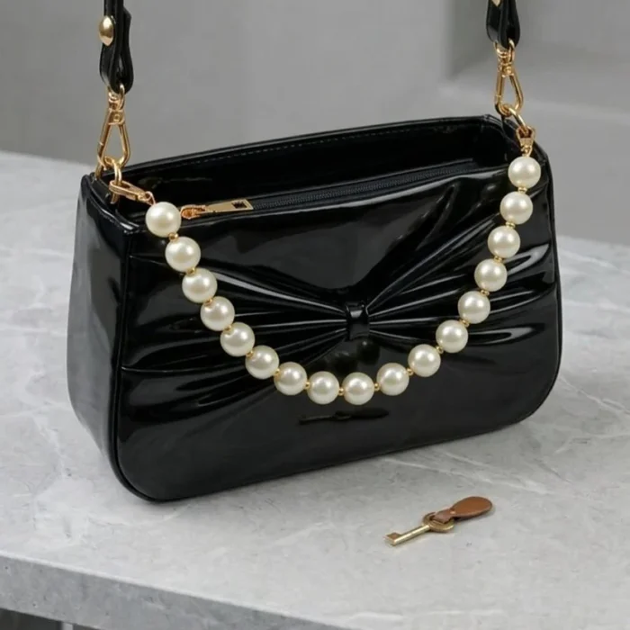 The Patent Bow Bag handbag by Zhenova