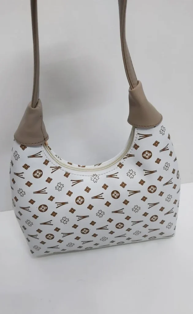 The Monogram Shoulder Bag handbag by Zhenova