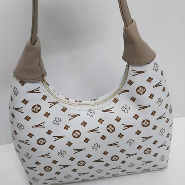 The Monogram Shoulder Bag handbag by Zhenova