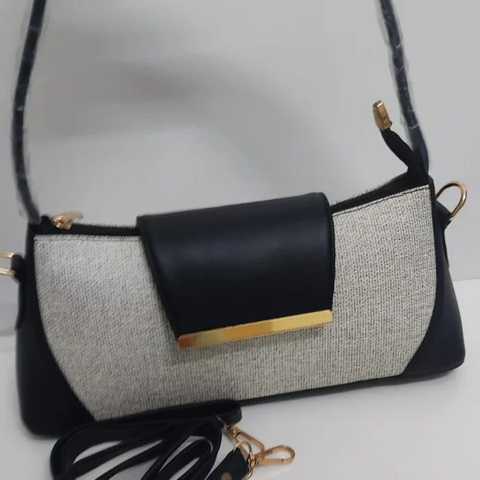 The Textured Sling Bag handbag by Zhenova