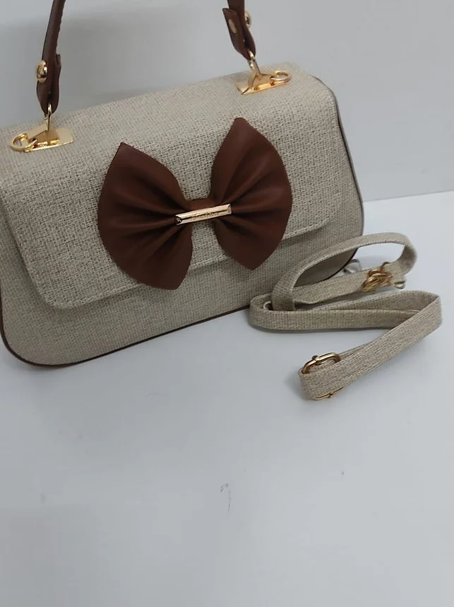 The Jute Bow Handbag - Brown bow, with sling