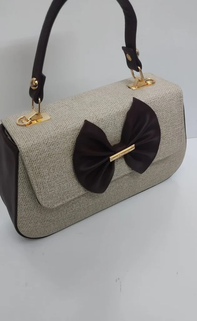 The Jute Bow Handbag handbag by Zhenova