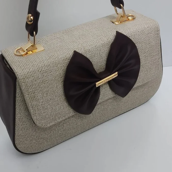 The Jute Bow Handbag handbag by Zhenova